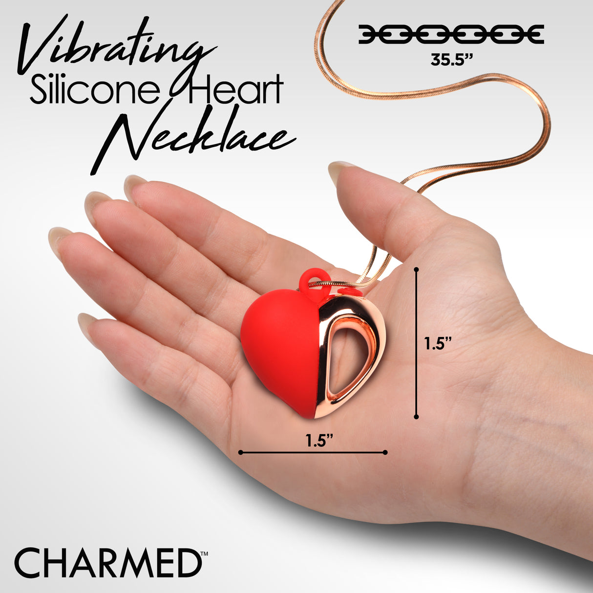10X Vibrating Silicone Heart Necklace displayed in hand, showcasing red silicone and rose gold design.