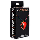 10X Vibrating Silicone Heart Necklace in stylish packaging with red heart pendant and rose gold accents.