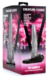 The Gargoyle Rock Hard Silicone Dildo Silver packaging featuring its textured design and bold branding.
