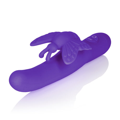 CalExotics Posh Fluttering Butterfly Vibrator Purple on a reflective surface, showcasing sleek design and butterfly feature.
