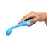 Close-up of a hand holding the BANG! Digital Silicone Vibrator in blue, showcasing its curved design and smooth texture.