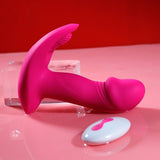 Litty Clitty Remote Control Wearable Vibrator on a pink surface with remote control for discreet pleasure.