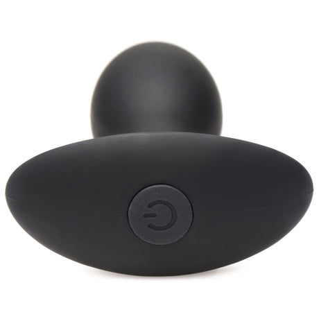 Rooster Rumbler Vibrating Silicone Butt Plug Medium with power button detail in black silicone.