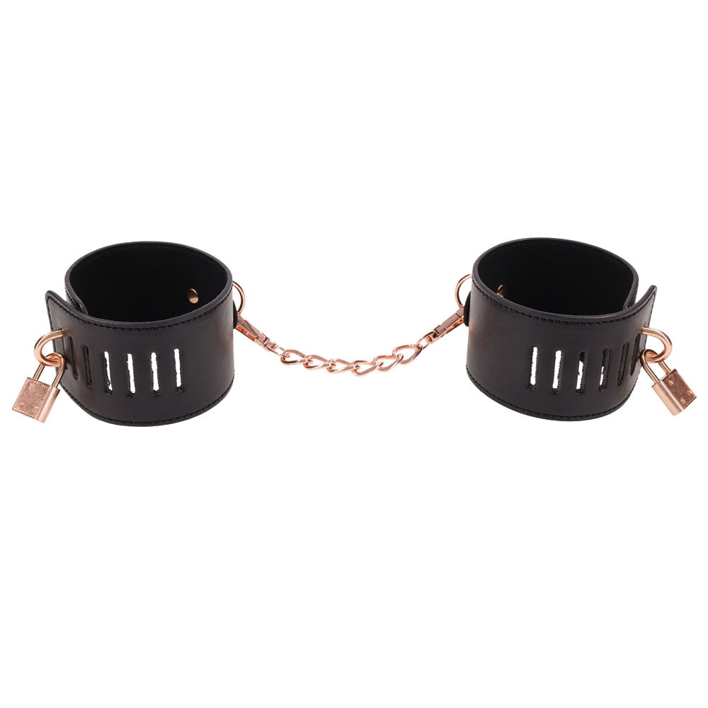 Sex and Mischief Brat Locking Cuffs Rose Gold Black featuring sleek black vegan leather and rose gold accents.
