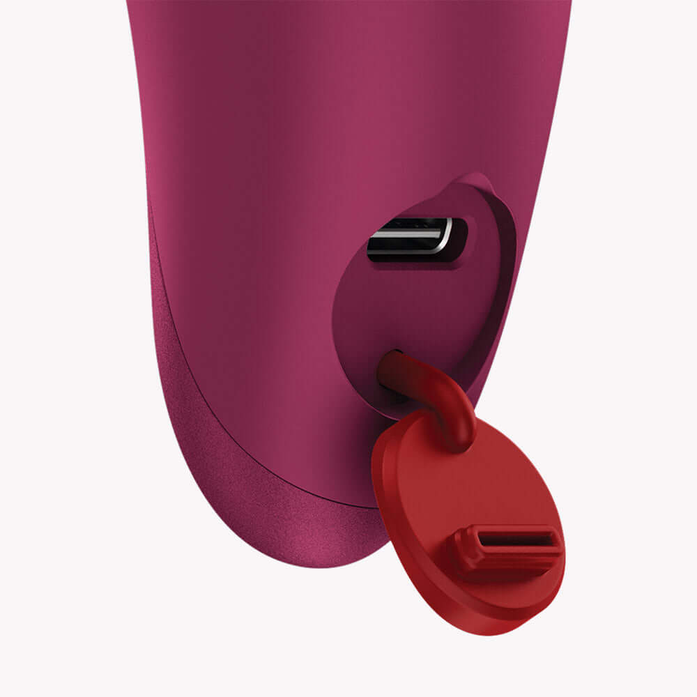 Close-up of the charging port on the Fun Factory Charme Rechargeable Bullet Vibrator Wine Red.