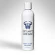 Helmet Grease Water Based Lubricant 8 Oz bottle with a sleek design featuring a logo and product information.