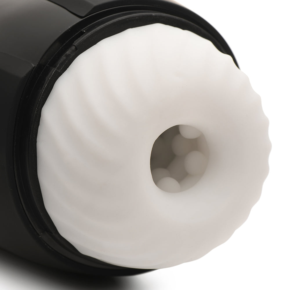 Close-up of the LoveBotz Milker Max, featuring a soft TPE sleeve with enticing textures for enhanced pleasure.