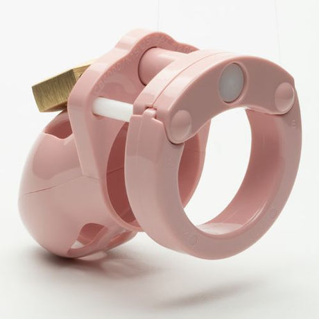 CB-X Mr Stubb Kit 1.75 Inch Pink Cock Cage compact male chastity device with locking mechanism in pink.