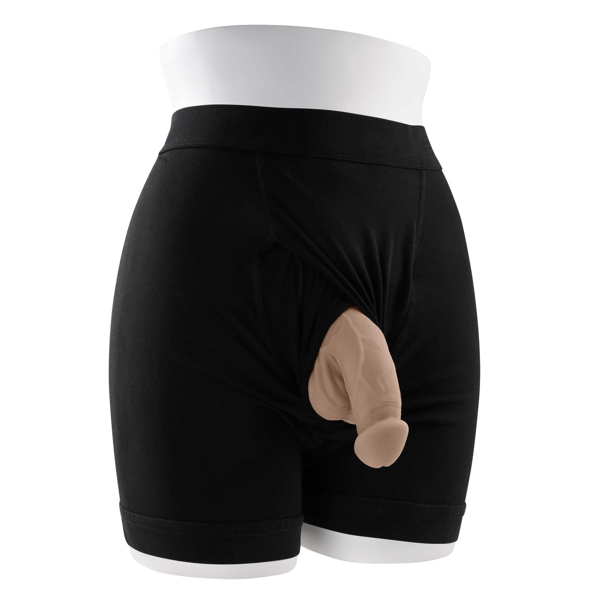Gender X 4 Inch TPE Packer Dildo Vanilla displayed in black underwear with realistic bulge and design.