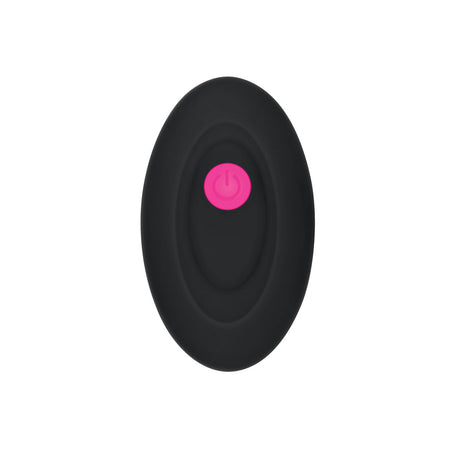 Gender X Pink Paradise Remote Control Vibrator Clear remote control with pink button on a sleek black design