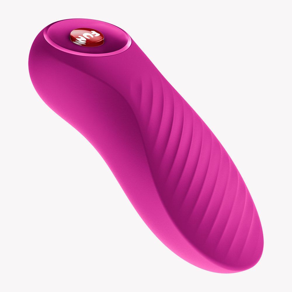Fun Factory Bijou Bullet Vibrator Magenta showcasing its wavy texture and compact design for powerful stimulation.