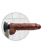 King Cock 10 Inch Vibrating Dildo with Balls Brown mounted on a bathroom wall, showing realistic detail and design.