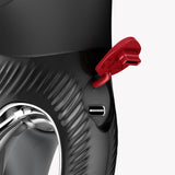 Detail of the charging port on the Fun Factory Miss Bi Black Line Dual Action Vibrator with red cap.