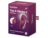 Satisfyer Tap & Climax 2 Lay-On Clitoral Vibrator Red packaging showcasing its tapping and vibration features.