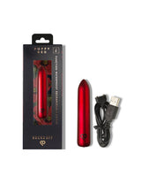 Poppy Red Rechargeable Bullet Vibrator in box with USB charging cable beside it.