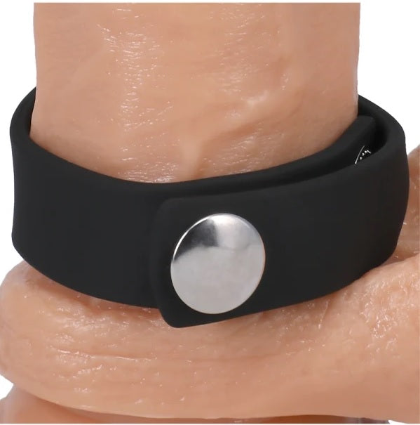 Rock Solid Silicone 3 Snap Adjustable Cock Ring Black on skin, showcasing adjustable snap closure and body-safe silicone.