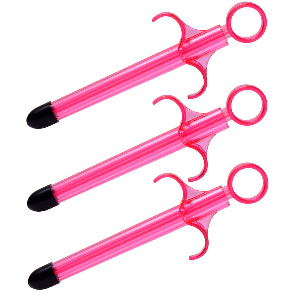 Pink lubricant launchers, 3-pack with finger grips for easy and precise application during intimate play.