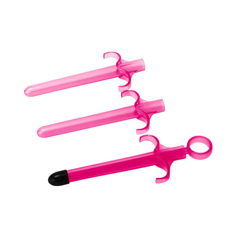 Trinity Vibes lubricant launcher 3-pack in pink, designed for easy and precise lubrication for intimate play.