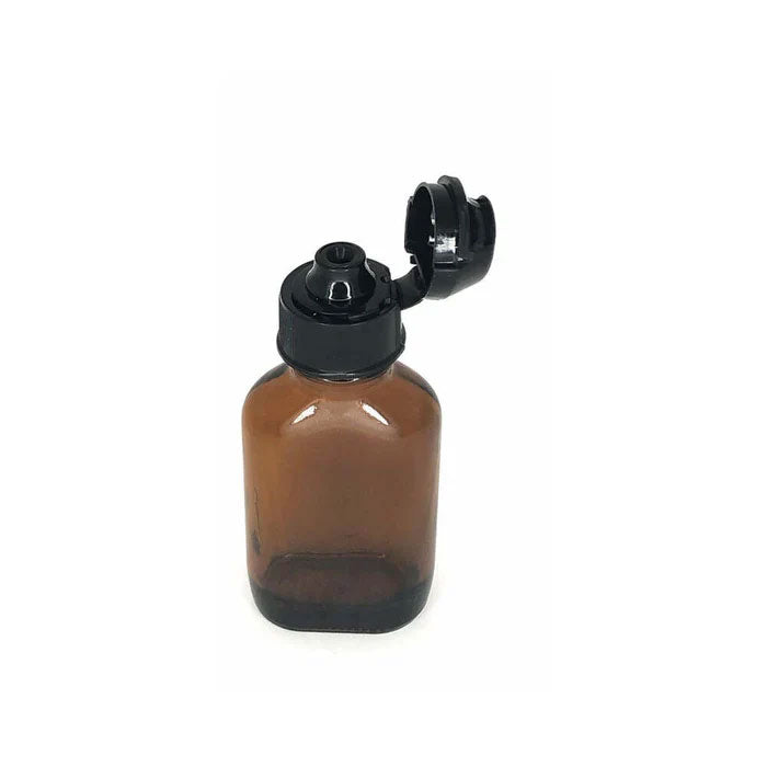 Skwert Aroma Topper Large Thread Bottle Adapter on a brown aroma bottle with a flip-top cap.