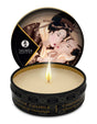 Shunga Mini Massage Candle Excitation Intoxicating Chocolate 1 Oz with flame, depicting romantic design on lid.