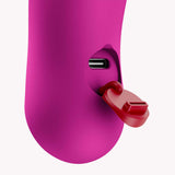 Fun Factory Bijou Rechargeable Bullet Vibrator Magenta showing charging port and cap.