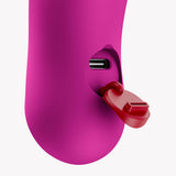 Close-up of the charging port on the Fun Factory Bijou Bullet Vibrator Magenta with a red cap.
