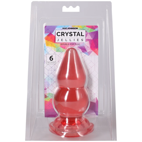 Crystal Jellies Double Pop Plug 6 Inch Pink in packaging showcasing its double curve design.