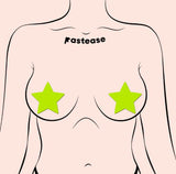 Pastease Star Glow In The Dark Neon Yellow stars on a minimal design mannequin, perfect for festival outfits.