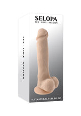 Selopa 6.5 Inch Natural Feel Dildo with Balls Vanilla in packaging, showcasing realistic design and dual-layer construction.
